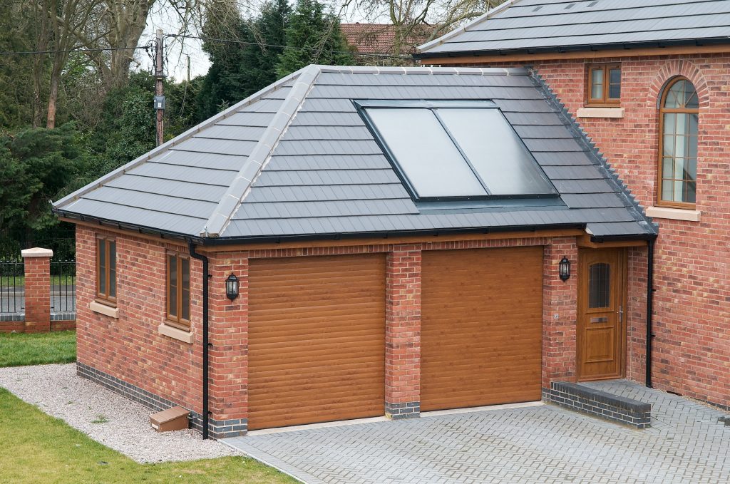 Twin golden oak shutter doors